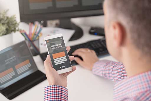 Designer working on responsive web design project