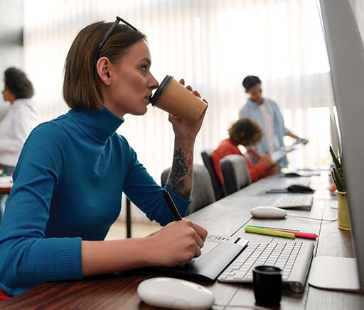 ADMS Side view of a young female web designer